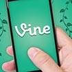 hand holding phone with vine text inside